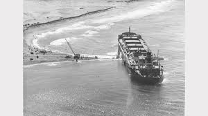 The MV Sygna after running aground on Stockton Beach in May 1974 Picture: portstephensexaminer.com.au
