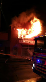 Fire rips through the Rahmani's Rug Gallery in Parry Street Picture: Merewether Fire & Rescue
