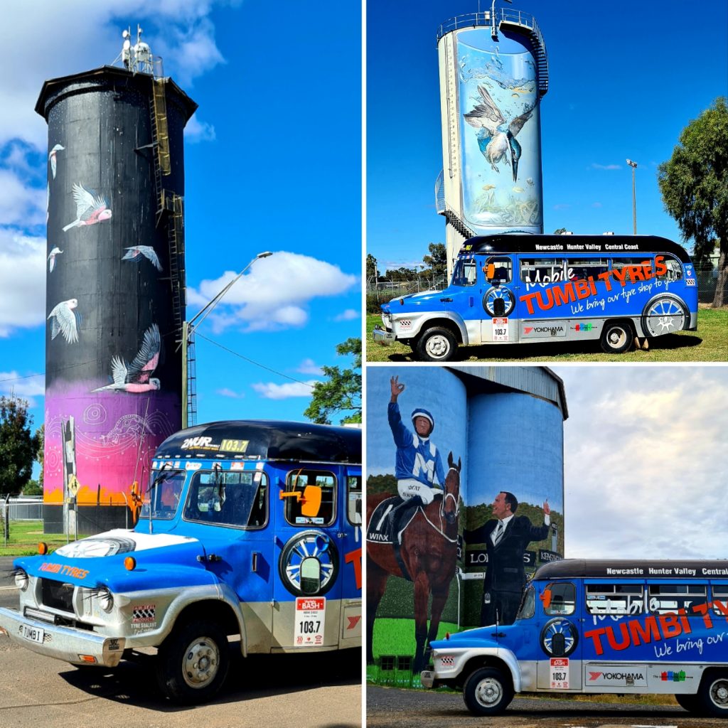 Tumbi Tyres bash bus in front of silo art.